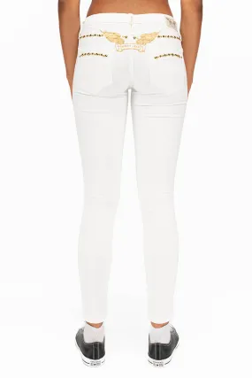 MARILYN WOMENS STUDDED SKINNY JEANS IN WHITE WITH GOLD WINGS AND GOLD STUDS AND CRYSTALS