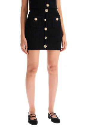 "knitted mini skirt with jewel buttons